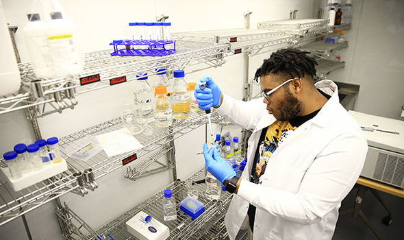 BSU chemistry student Fegens Lyncee working in a lab