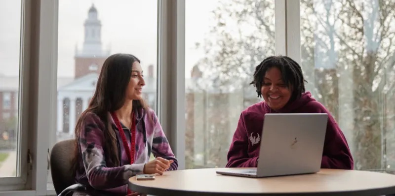 Two students work from a table