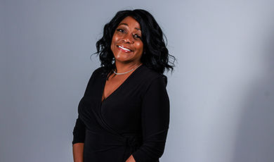 Portrait photo of Tiffony Cesero  in front of a white backdrop