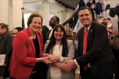 Jennifer Santana, ’22, shakes hands with Bristol President L