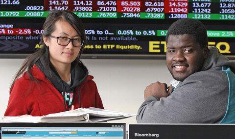 Two students in the Bloomberg lab